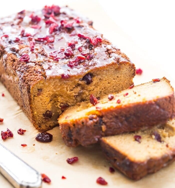 This paleo cranberry orange pound cake is such a wonderful paleo fall recipe! With fresh orange flavor and sweet-tart dried cranberries, this paleo cranberry orange pound cake is tender, moist, and full of flavor. This paleo cranberry orange pound cake takes full advantage of such a fantastic flavor combo and uses all healthier ingredients to make a lovely paleo fall recipe! Plus, details on how to put together the best pregnancy care package (not for me!).