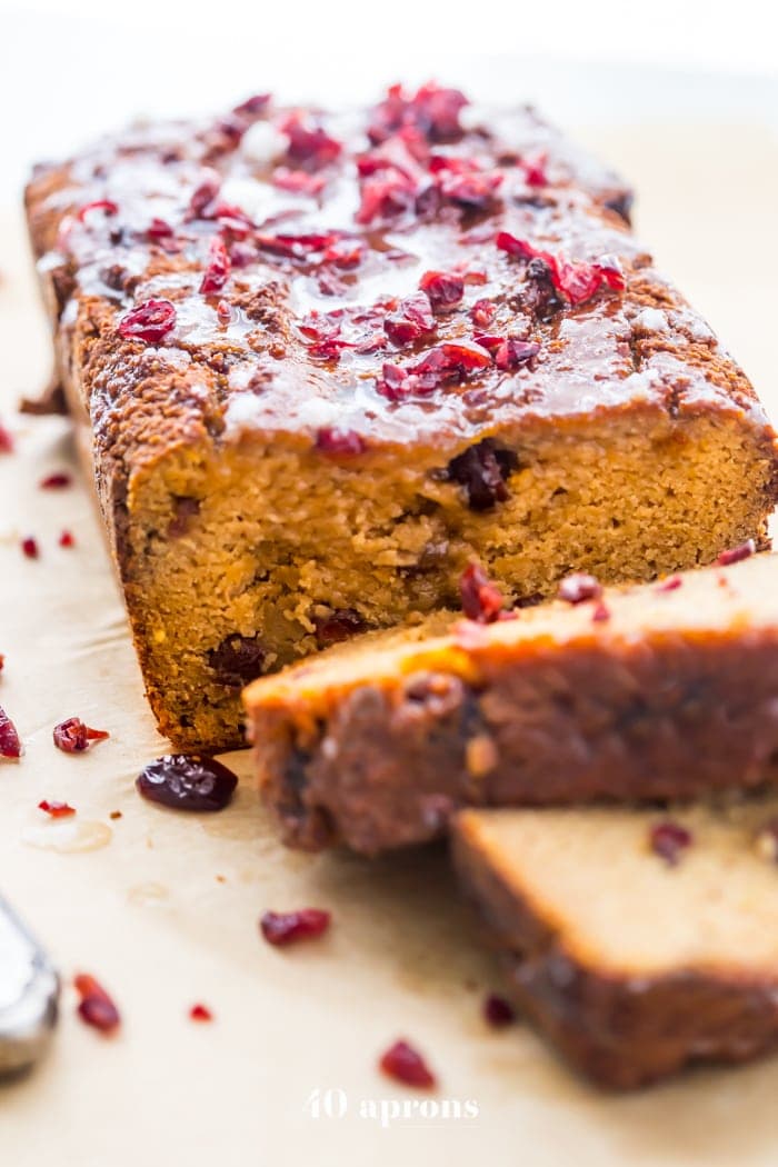 This paleo cranberry orange pound cake is such a wonderful paleo fall recipe! With fresh orange flavor and sweet-tart dried cranberries, this paleo cranberry orange pound cake is tender, moist, and full of flavor. This paleo cranberry orange pound cake takes full advantage of such a fantastic flavor combo and uses all healthier ingredients to make a lovely paleo fall recipe! Plus, details on how to put together the best pregnancy care package (not for me!). 