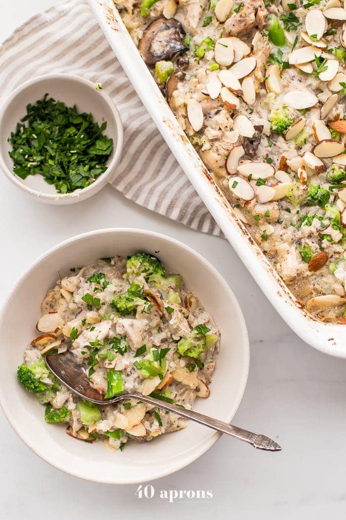 This Whole30 casserole is a perfect Whole30 fall recipe, loaded with warming and filling ingredients. This Whole30 casserole is made with chicken, broccoli, cauliflower rice, and mushrooms, making it full of protein, fiber, and healthy fats! This Whole30 casserole makes plenty of leftovers, making healthy lunches easy. With a homemade cream of mushroom soup, you'll love this Whole30 casserole on a round or anytime.