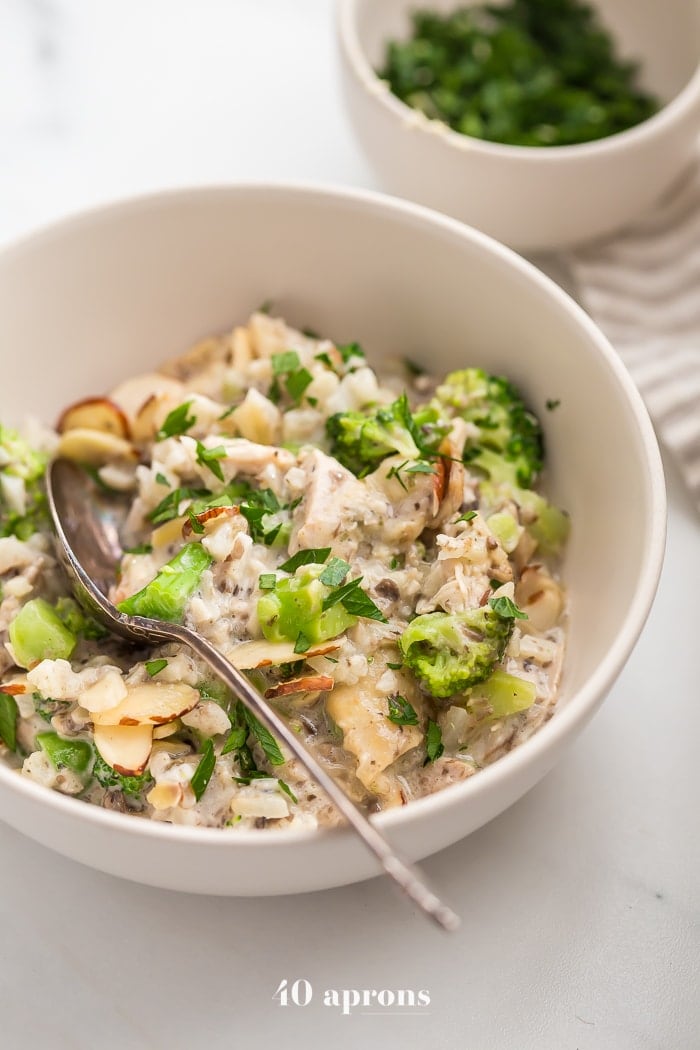 This Whole30 casserole is a perfect Whole30 fall recipe, loaded with warming and filling ingredients. This Whole30 casserole is made with chicken, broccoli, cauliflower rice, and mushrooms, making it full of protein, fiber, and healthy fats! This Whole30 casserole makes plenty of leftovers, making healthy lunches easy. With a homemade cream of mushroom soup, you'll love this Whole30 casserole on a round or anytime.