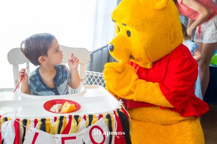 This DIY Winnie the Pooh birthday party is too cute! With tons of Winnie the Pooh birthday party ideas, this is your Winnie the Pooh birthday party guide. Happy birthday, little one! It'd make a great Winnie the Pooh baby shower, too.