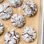 These peppermint paleo gluten-free crinkle cookies are fudgy and rich, perfect for the holidays. Grain-free and refined-sugar-free, these paleo gluten-free crinkle cookies are a guilt-free way to indulge in holiday treats without breaking your commitment to a healthier lifestyle. These paleo gluten-free crinkle cookies have hints of peppermint, making them positively festive. Your friends and family will never believe these gluten-free crinkle cookies are paleo!