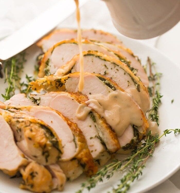 This Whole30 turkey breast and gravy is epic: brined to perfection with an herb butter stuffed under the skin (using ghee, of course)! It's my perfect Thanksgiving turkey made Whole30 Thanksgiving compliant, and it's a must for any paleo Thanksgiving or Whole30 Thanksgiving! This Whole30 turkey breast and gravy might actually become your favorite turkey recipe...