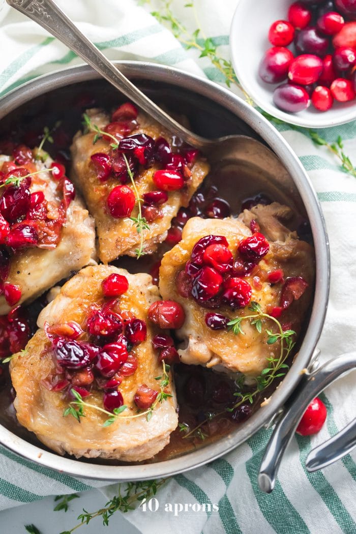 This Whole30 cranberry chicken is a simple but flavorful Whole30 dinner recipe that you'll love in the fall and winter! With just a few recipes, this Whole30 cranberry chicken is so good when you need a fruity flavor but want to keep it quick and easy. Bound to become a favorite Whole30 dinner recipe!