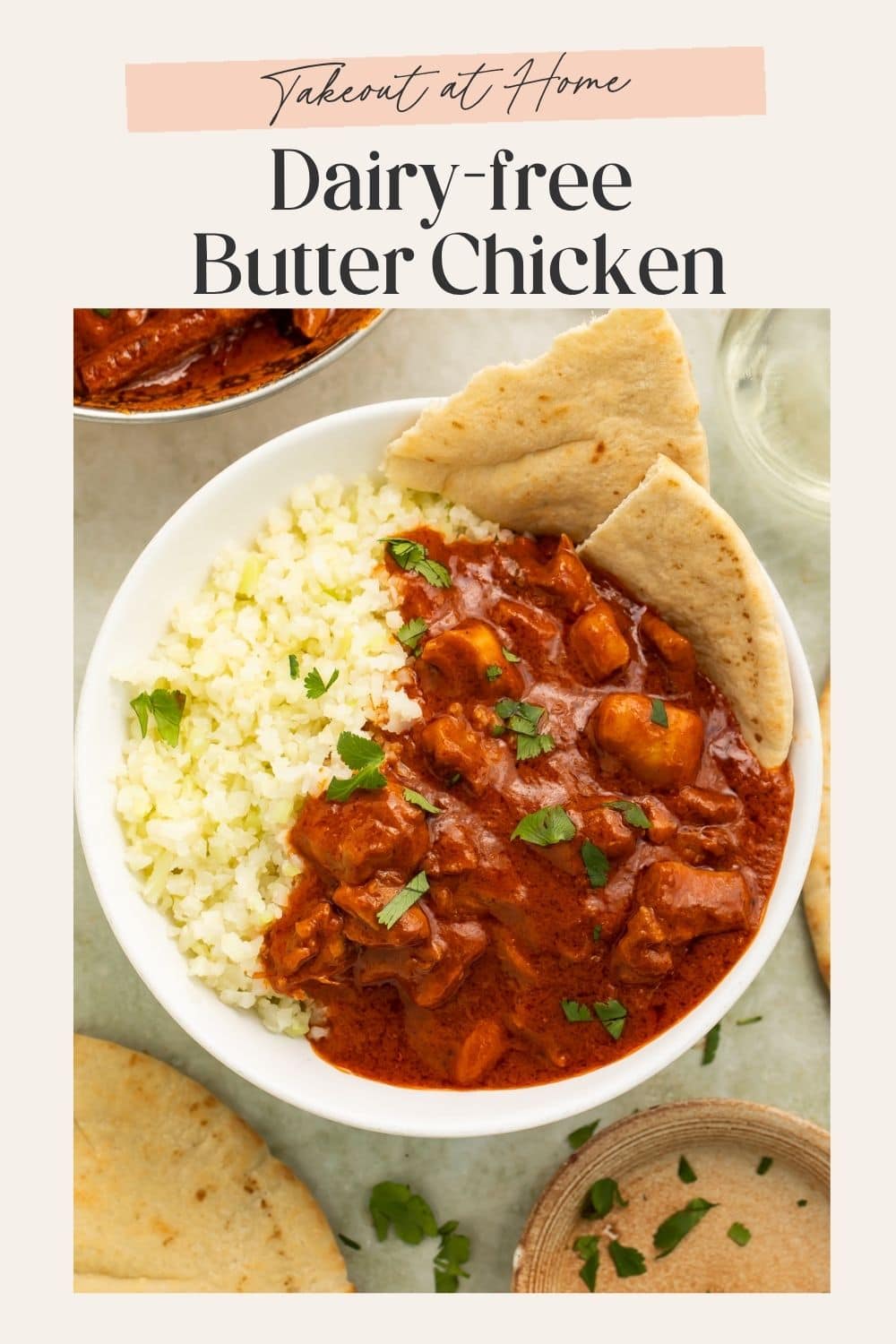 Bowl of cauliflower rice, dairy free butter chicken and naan. There is a frame on the image with Pinterest-optimized text.