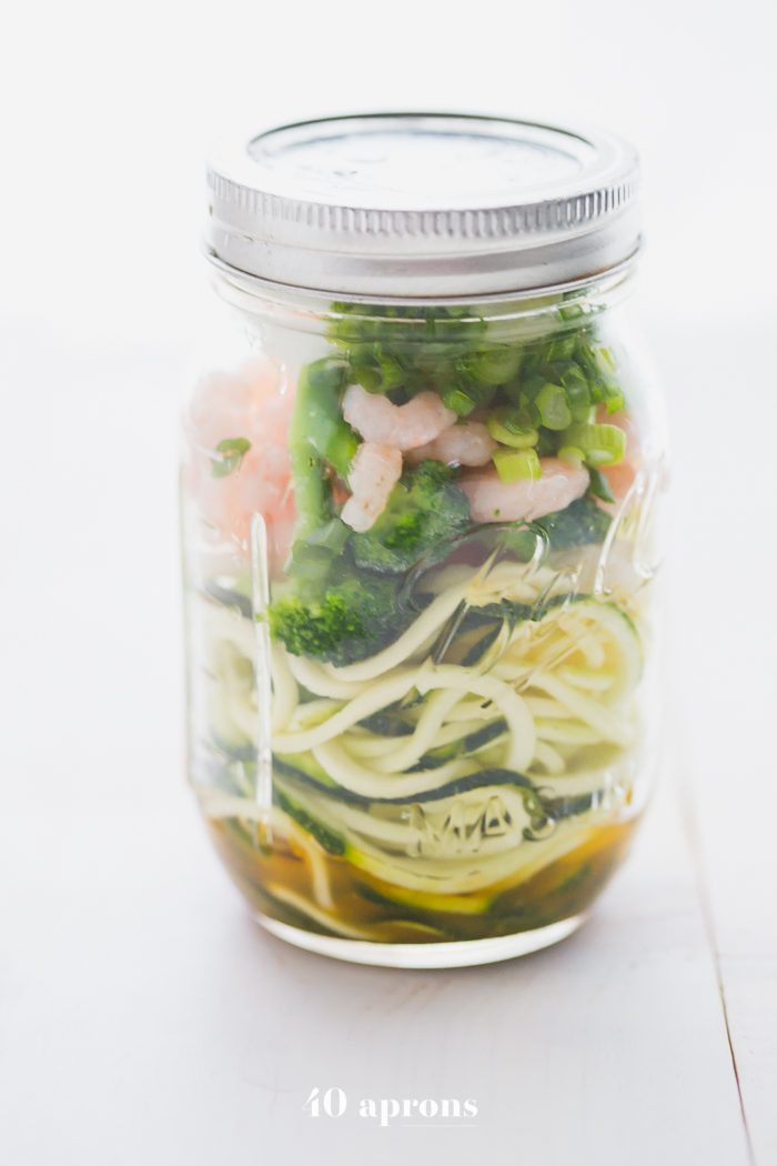 Whole30 cup zoodles: zucchini noodles with vegetables and shrimp in a mason jar