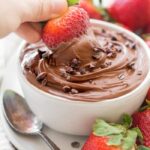 Paleo chocolate mousse dip with strawberry