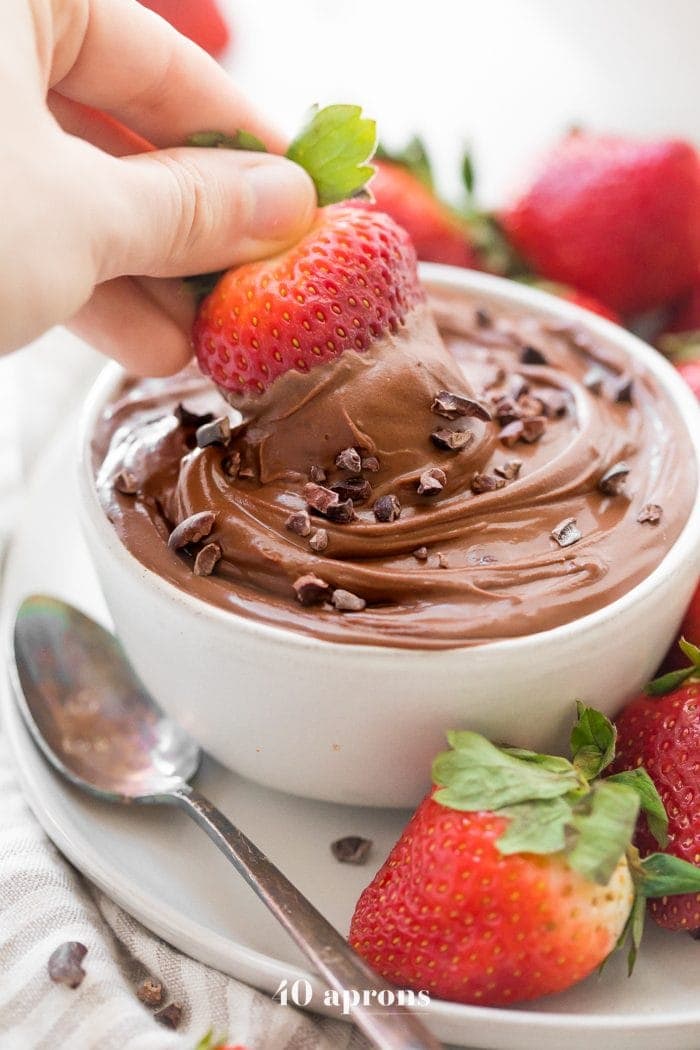 Paleo chocolate mousse dip with strawberry