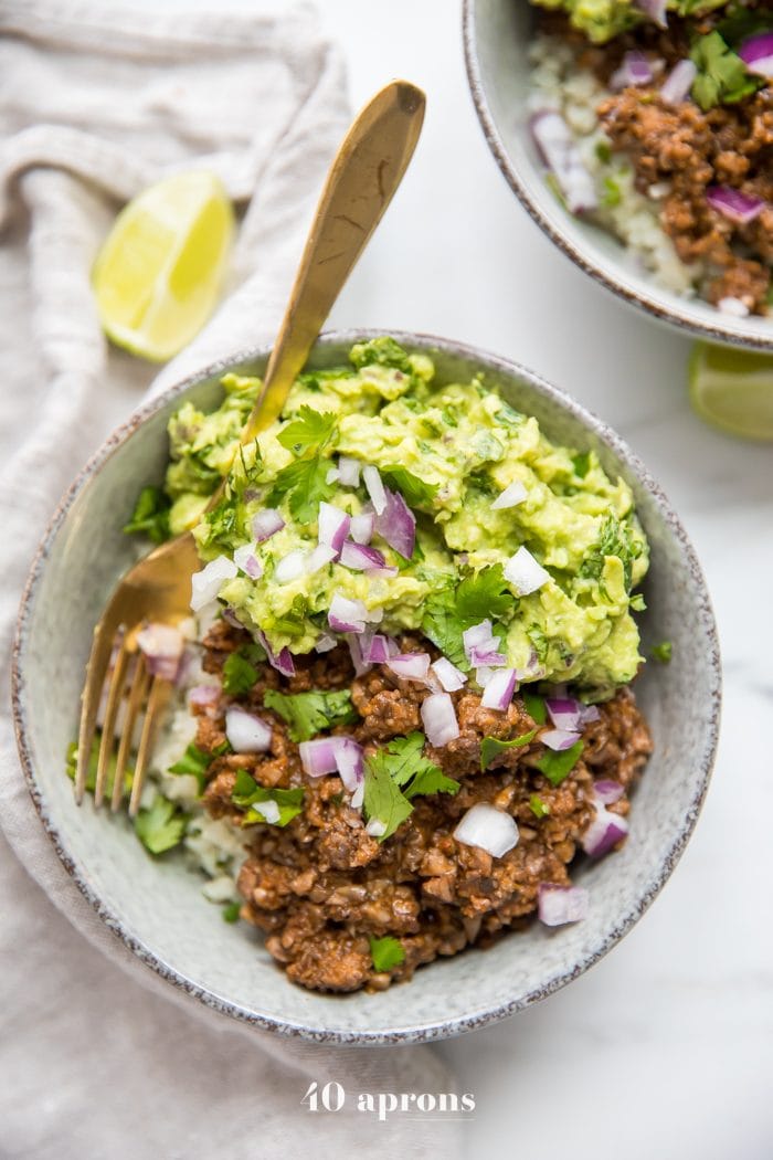 Whole30 chipotle beef & avocado bowl over cilantro-lime cauliflower rice