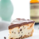 Slice of vegan no bake cookie dough cheesecake on a plate