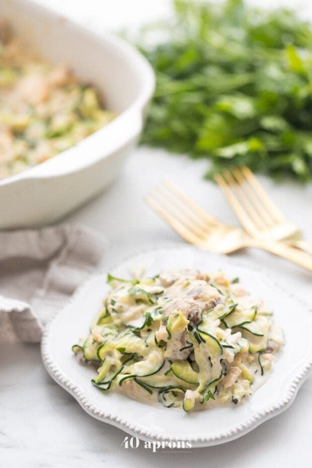 Whole30 tuna zoodle casserole on a plate next to a casserole