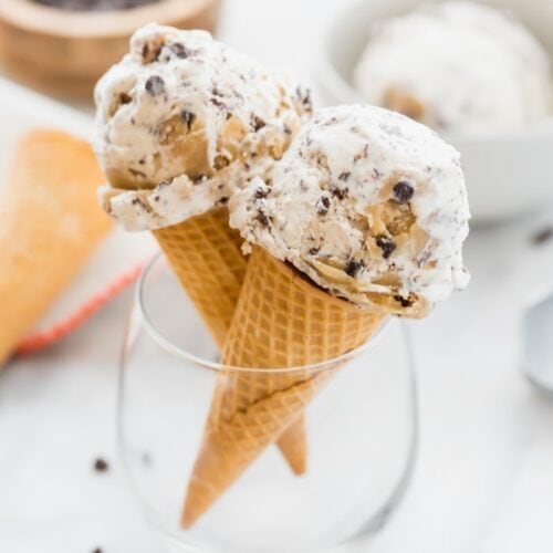 Two cones of paleo cookie dough ice cream