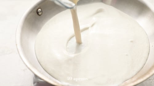 cottage cheese alfredo sauce poured into a sauce pan