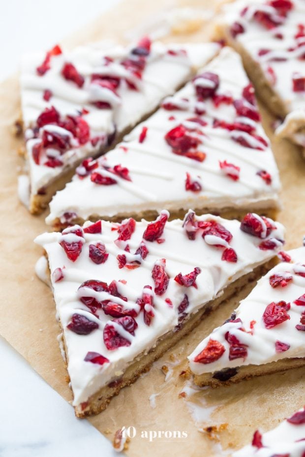 Healthy Christmas Treats Roundup Image of Paleo Cranberry Bliss Bars from 40 Aprons