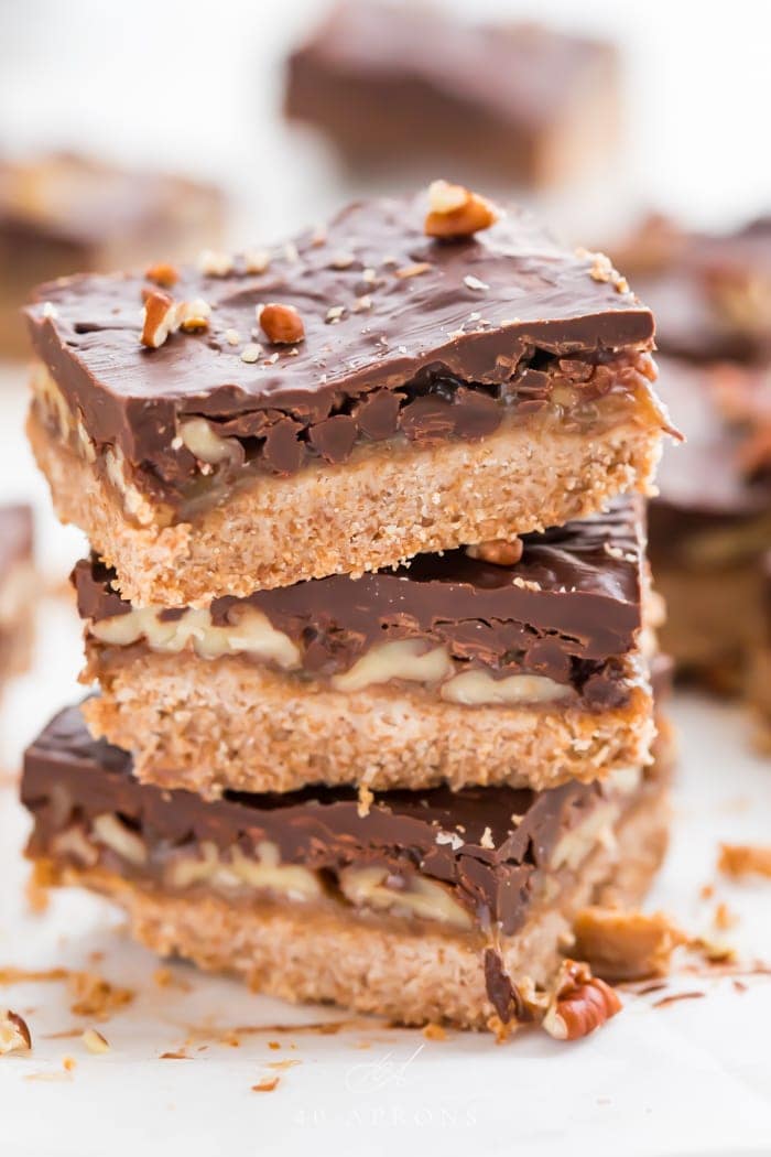 Three healthy paleo and vegan turtle bars stacked on top of each other