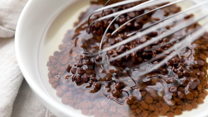 Melt chocolate chips and coconut oil then whisk until smooth