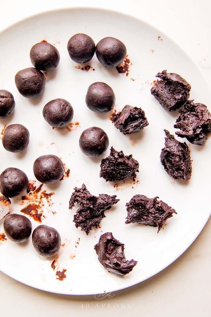 Balls of chocolate truffle mixture on a plate