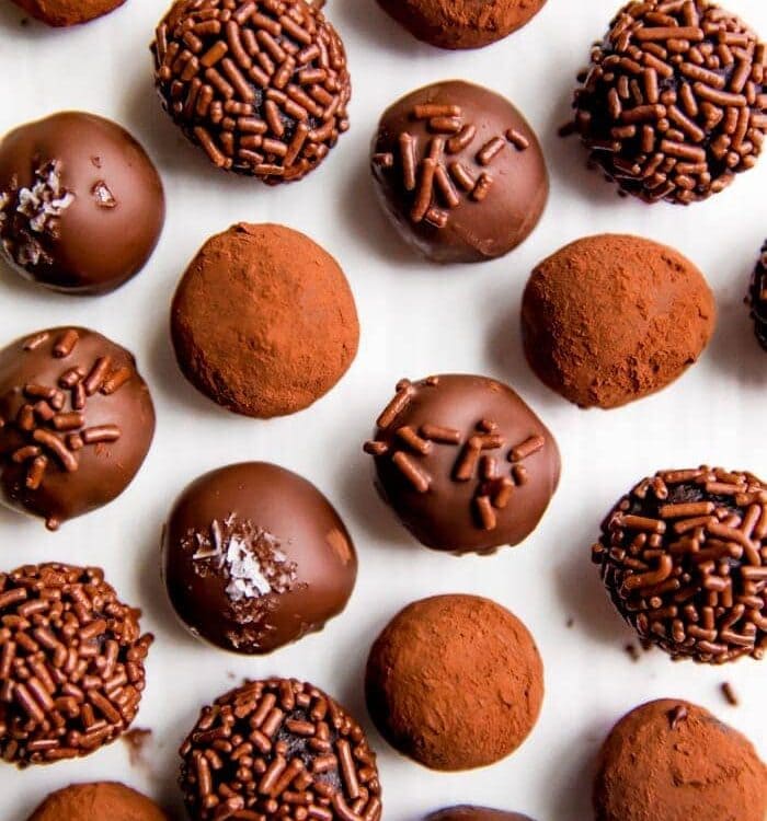 Several healthy vegan chocolate truffles shot overhead