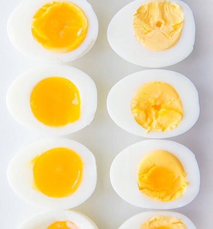 Hard and soft boiled eggs cut in half
