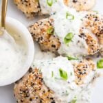 Chicken with everything bagel seasoning topped with scallion cream cheese sauce