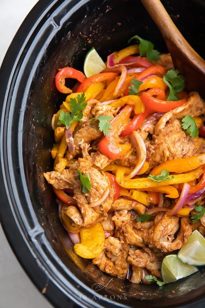 Top down shot of cooked crockpot chicken fajitas