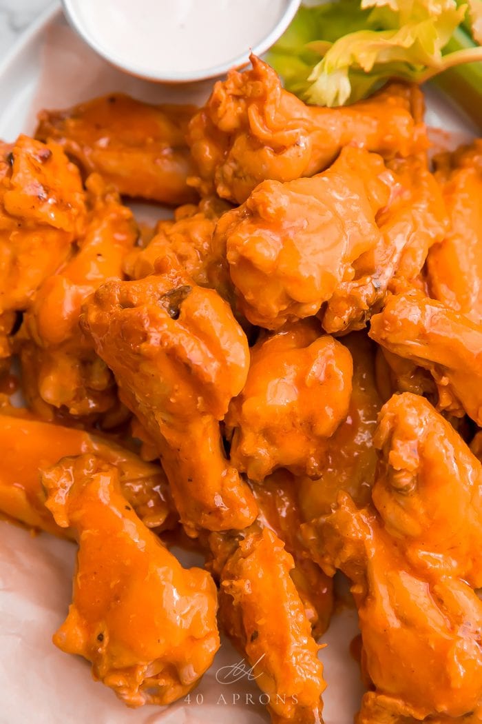 Crockpot chicken wings served with dipping sauce