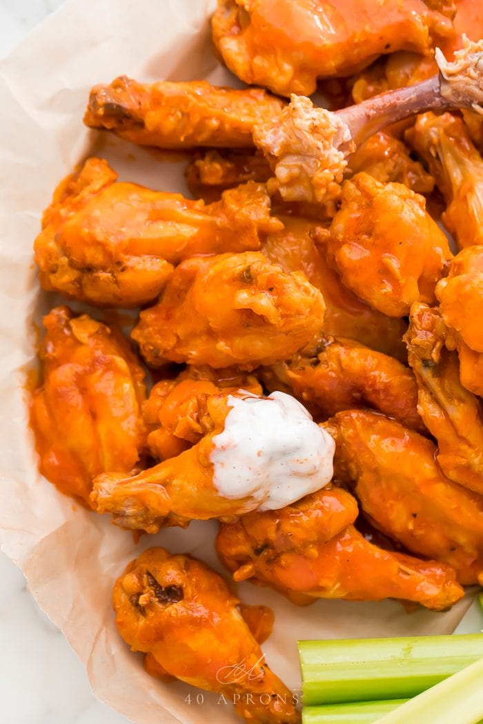 Close up of crockpot chicken wings on a plate
