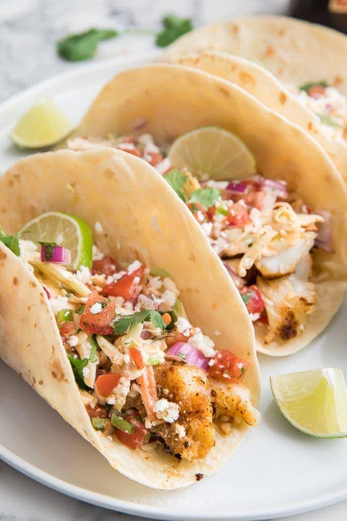 Close up of an easy fish taco on a white plate