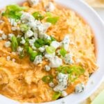 Slow Cooker Buffalo Chicken in a white bowl