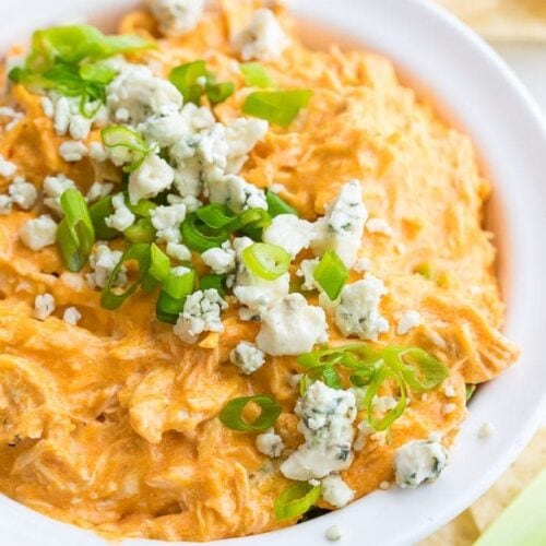 Slow Cooker Buffalo Chicken in a white bowl