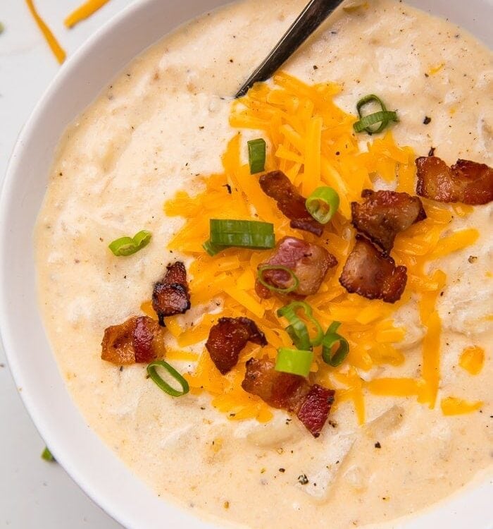 Soup topped with cheese and bacon