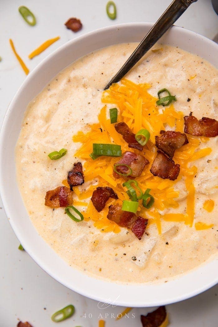 Soup topped with cheese and bacon