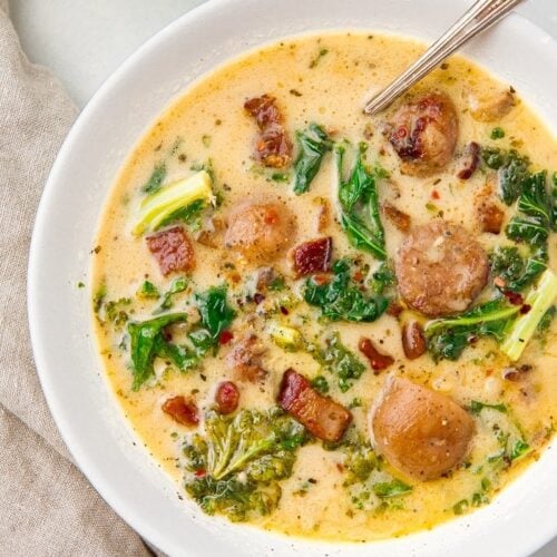 Crockpot zuppa toscana served in a white bowl