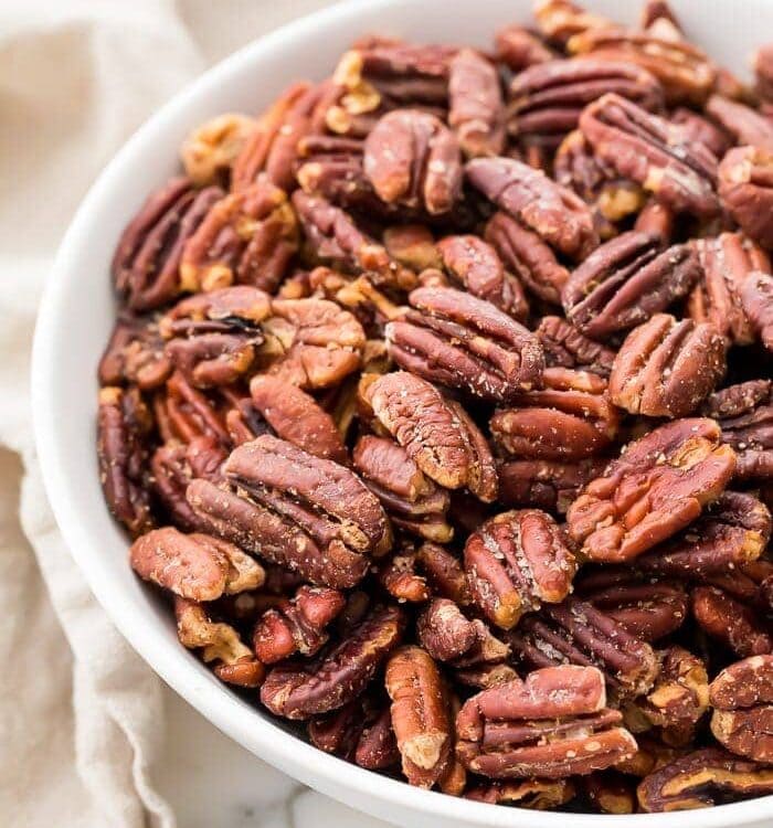 Toasted pecans in a serving dish
