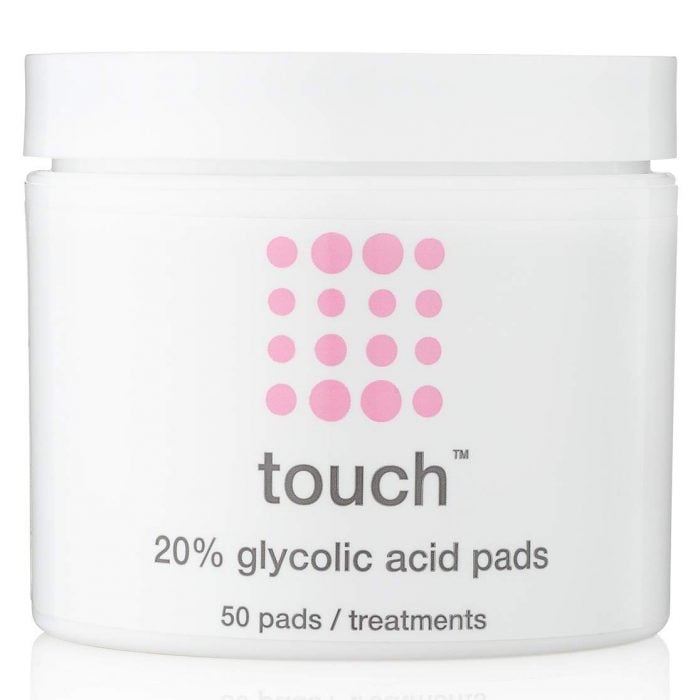 a container with glycolic acid exfoliation pads for acne plagued skin against white background