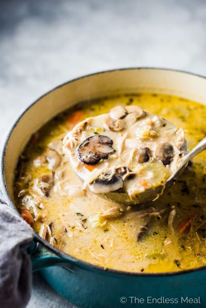Creamy Thanksgiving leftover turkey soup in a ladel
