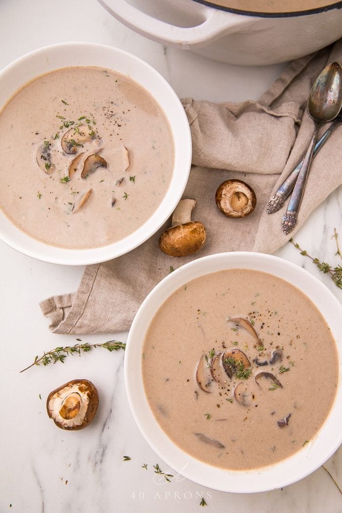 Two bowls of cream of mushroom soup