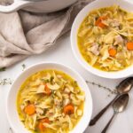 Two bowls of leftover turkey soup