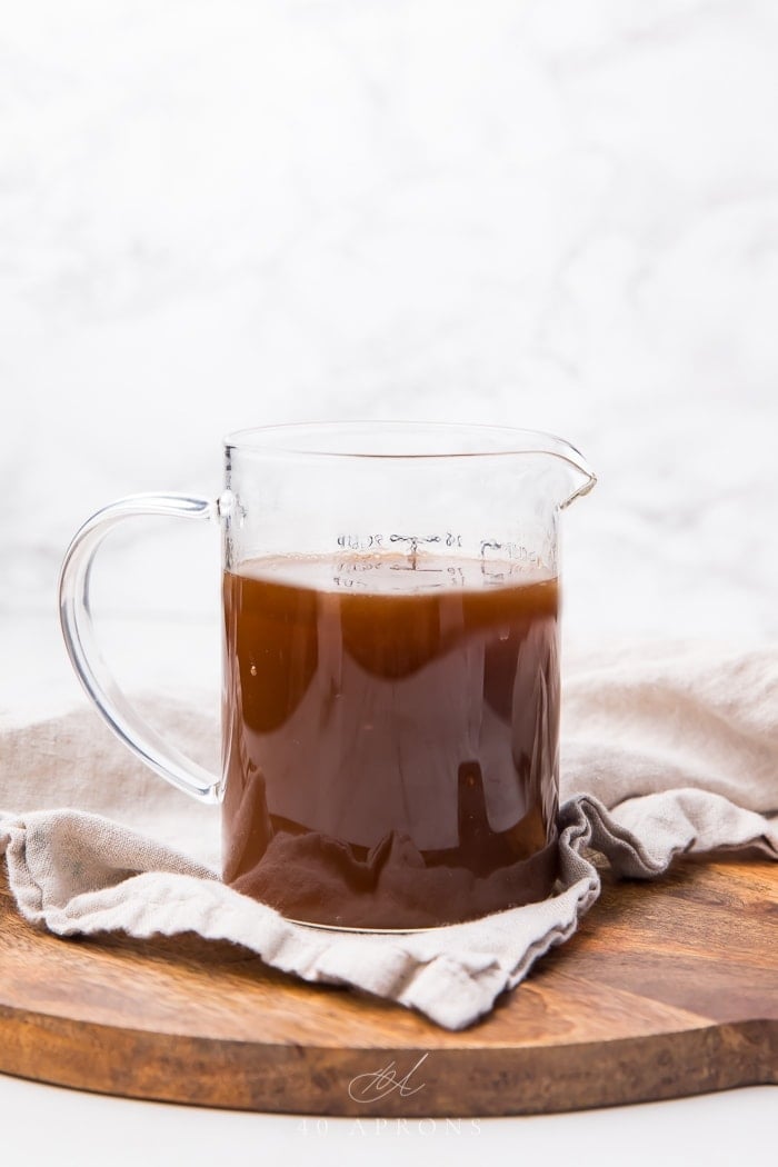 Au jus in a glass jug