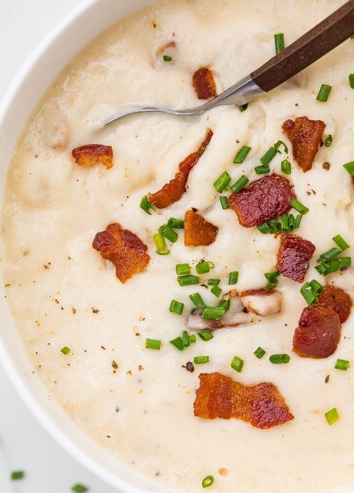 Whole30 potato soup up close with bacon and chives