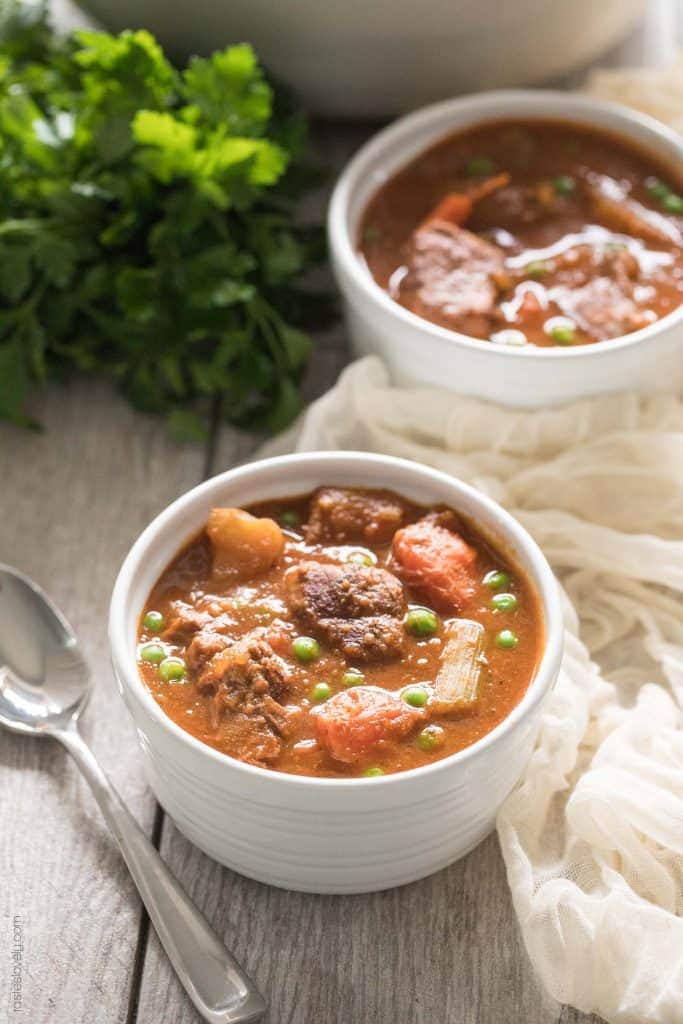 whole30 beef stew served in two white bowls