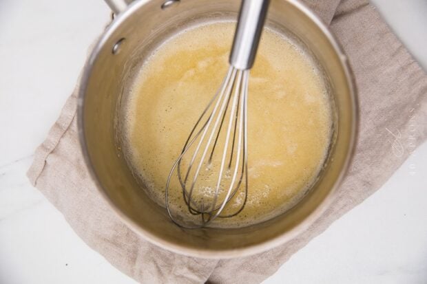 butter and flour in a sauce pan with a whisk