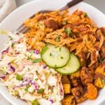 BBQ chicken bowl with sweet potatoes and coleslaw in a bowl
