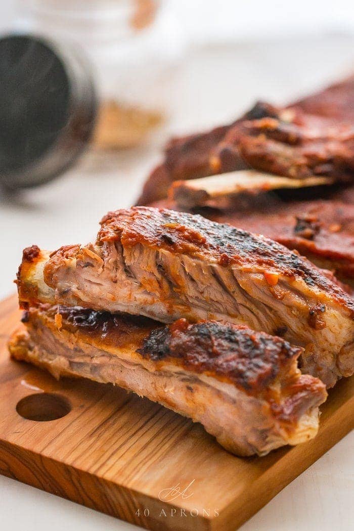 Close up of baby back ribs on a chopping board