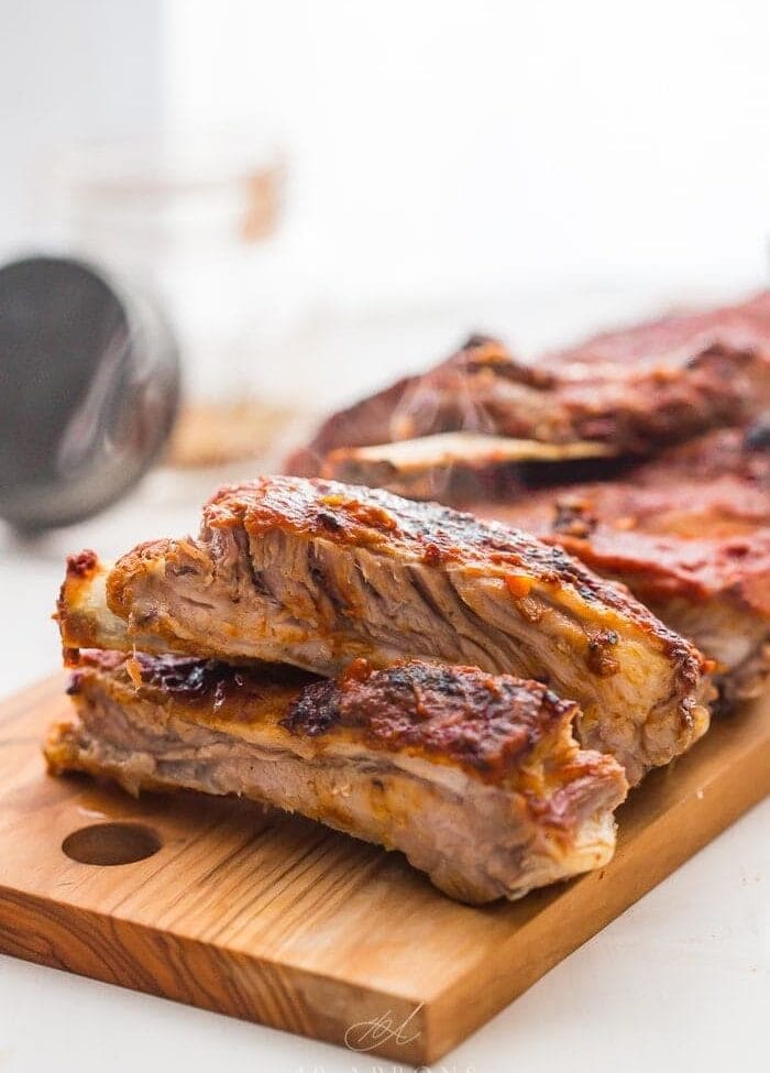 Instant pot baby back ribs on a wooden chopping board