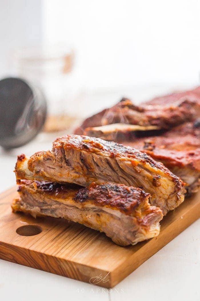 Instant pot baby back ribs on a wooden chopping board