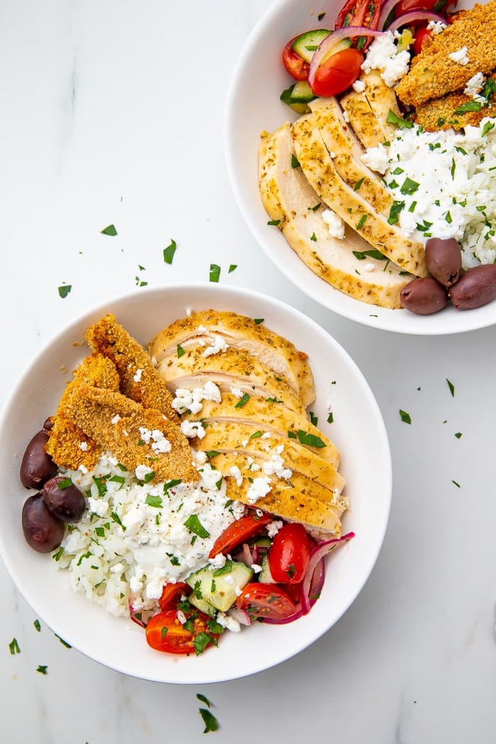 Two Greek chicken bowls