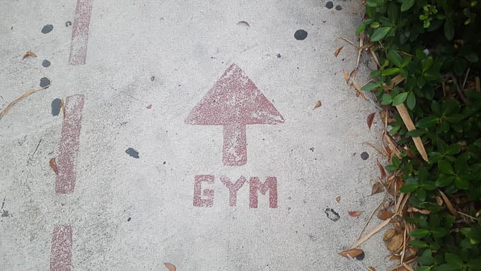 image of gym painted on concrete with arrow