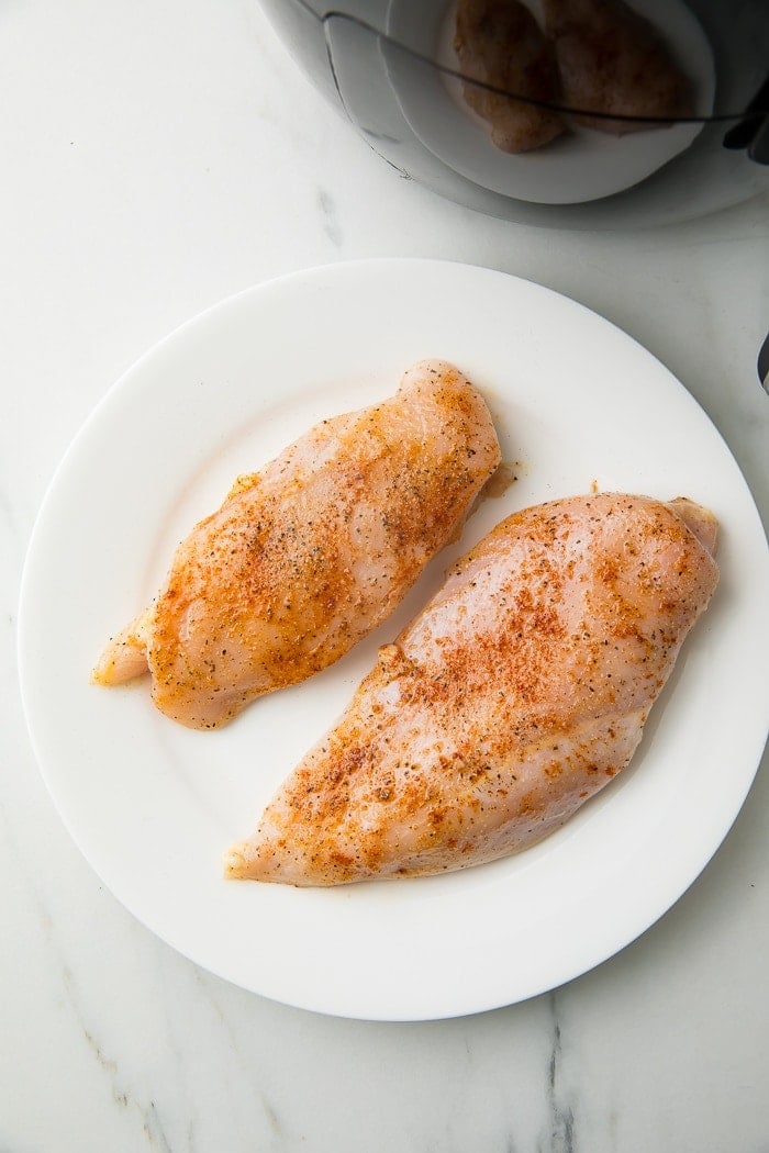 Seasoned chicken breast on a plate