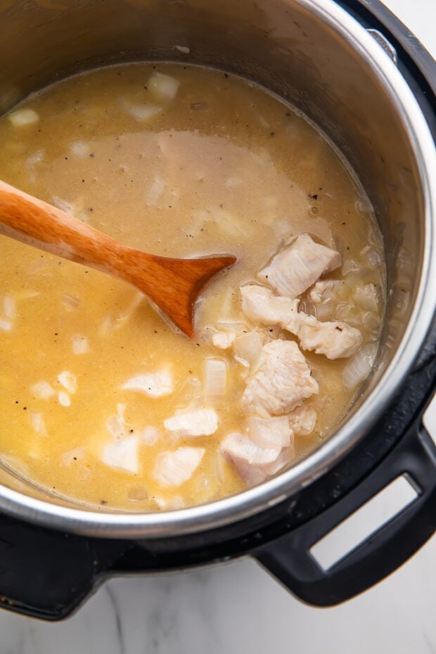 Add in chicken broth and liquid ingredients to Instant Pot